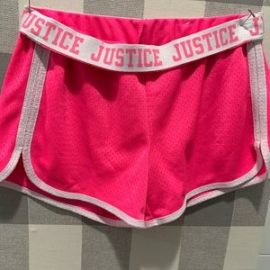 Hot pink Justice athletic shorts. With fold down waist band.